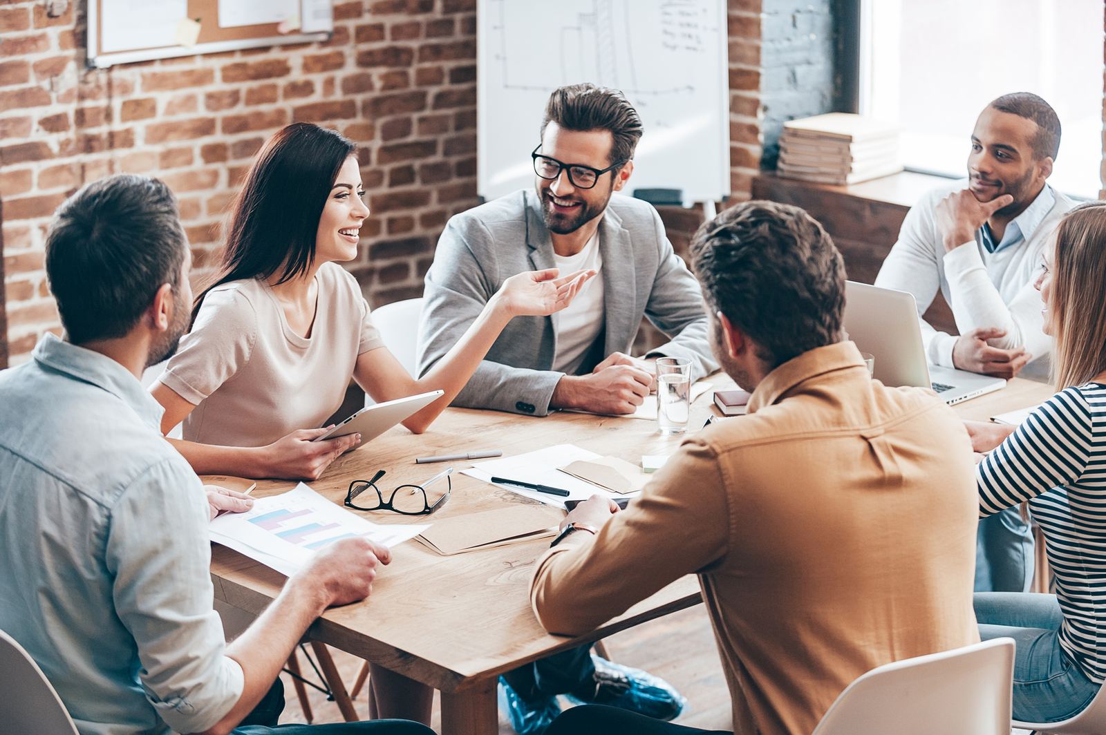 Exonex consultants collaborating with a client team